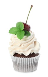 Delicious cupcake with cream, cherry and mint isolated on white