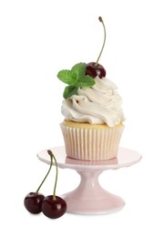 Photo of Delicious cupcake with cream, cherries and mint isolated on white