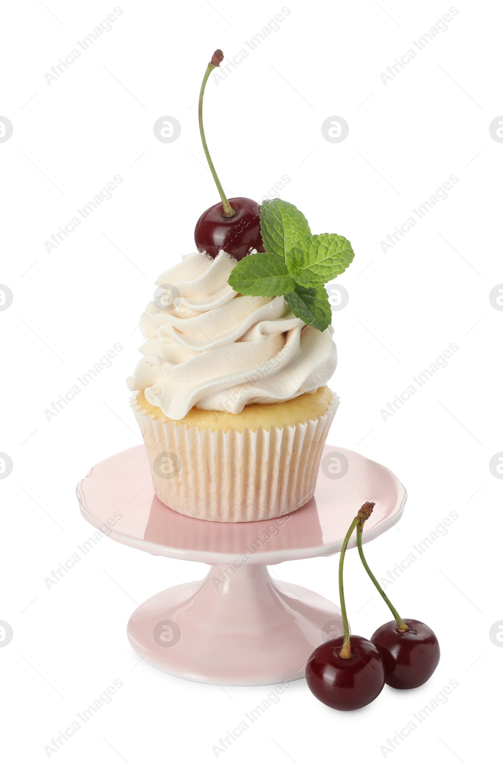 Photo of Delicious cupcake with cream, cherries and mint isolated on white