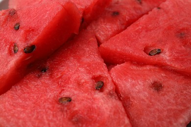 Photo of Pieces of tasty watermelon as background, closeup