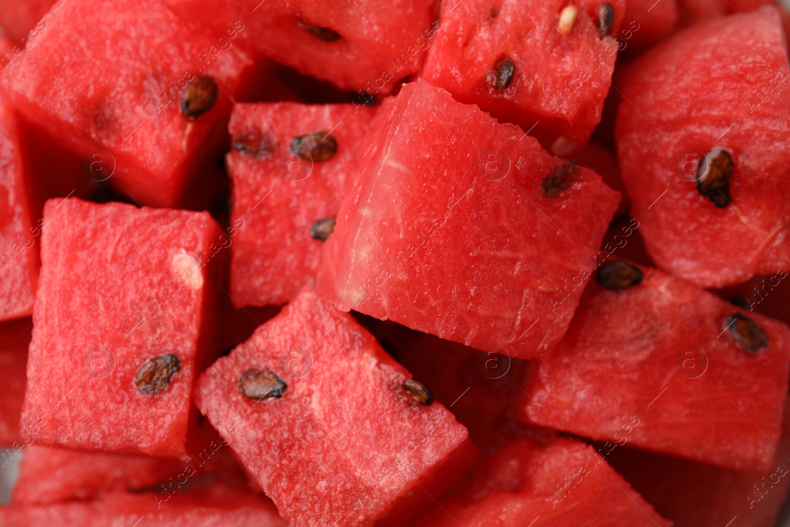 Photo of Pieces of tasty watermelon as background, top view