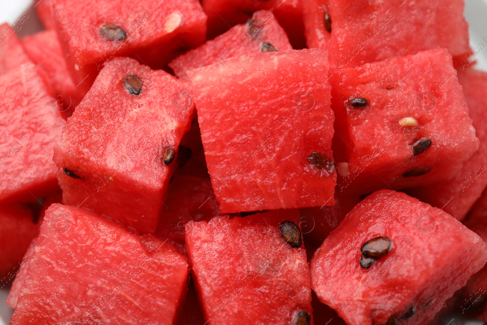 Photo of Pieces of tasty watermelon as background, closeup