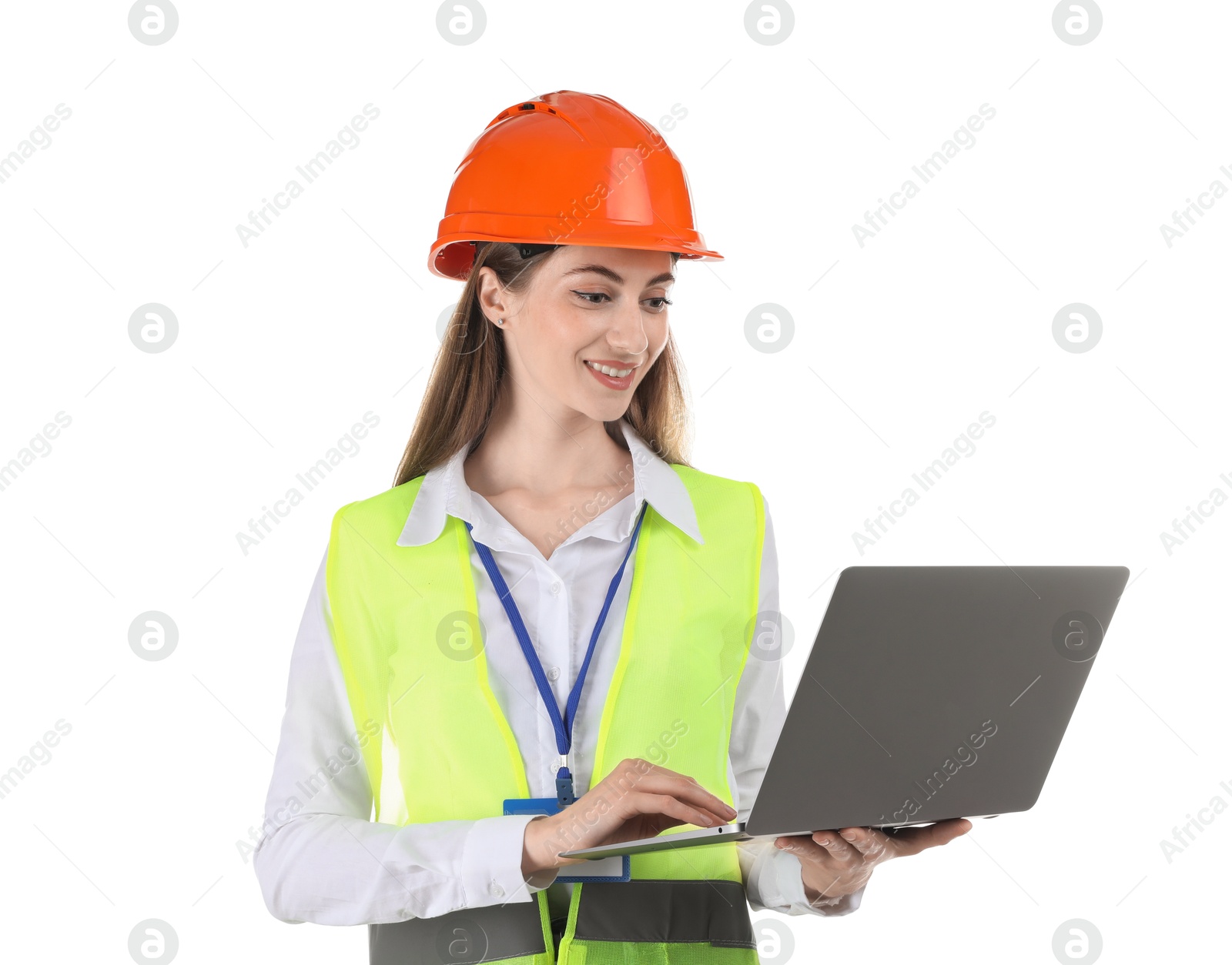 Photo of Engineer in hard hat with laptop on white background