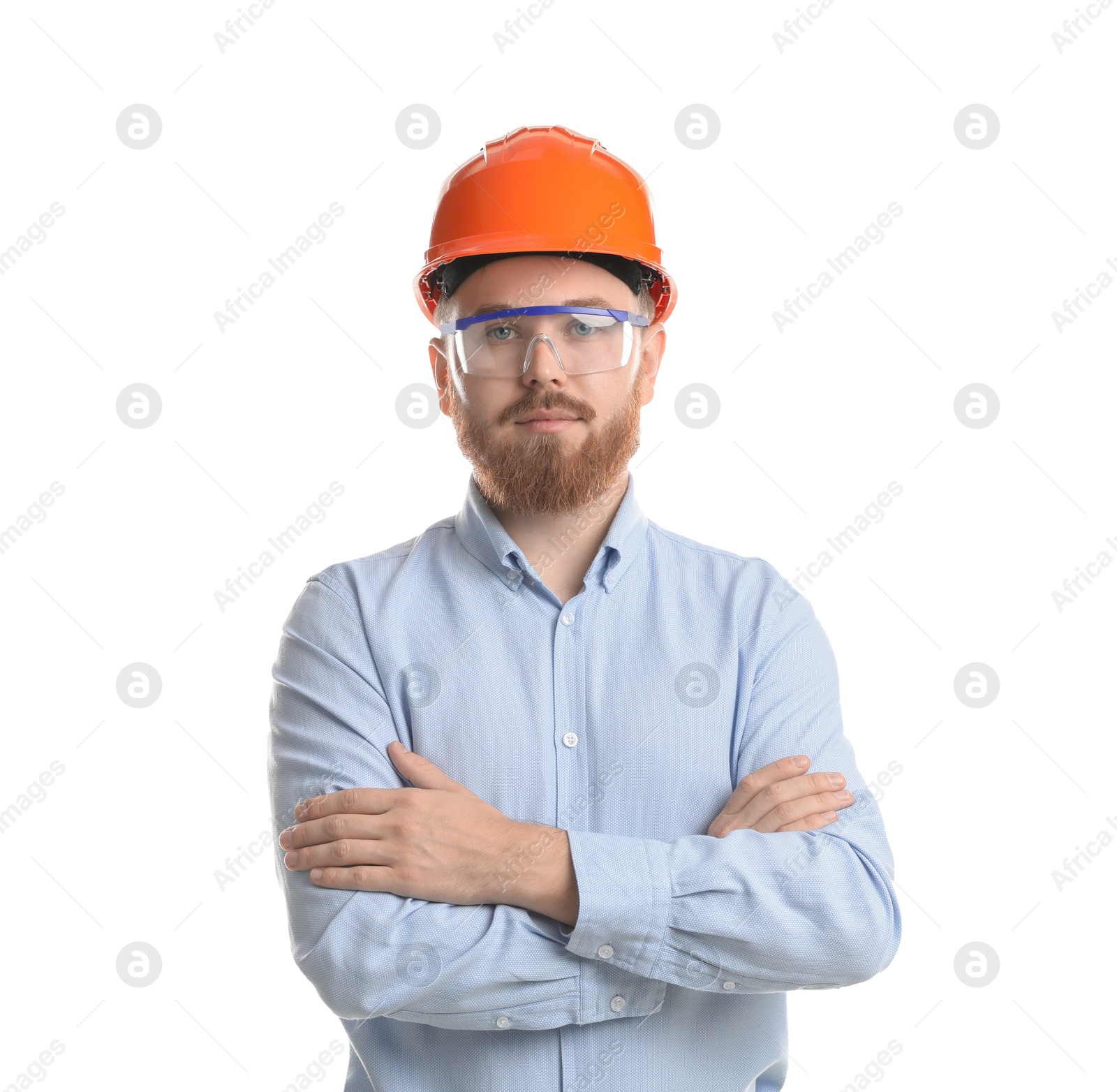 Photo of Engineer in hard hat and goggles on white background