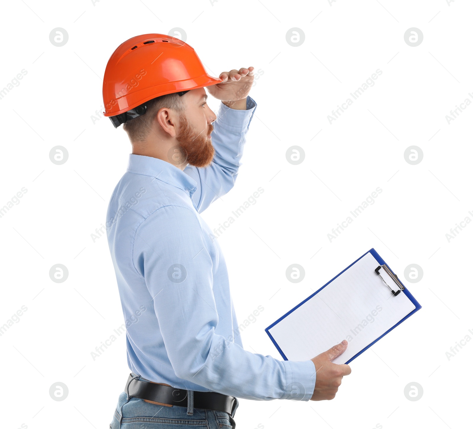 Photo of Engineer in hard hat with clipboard on white background