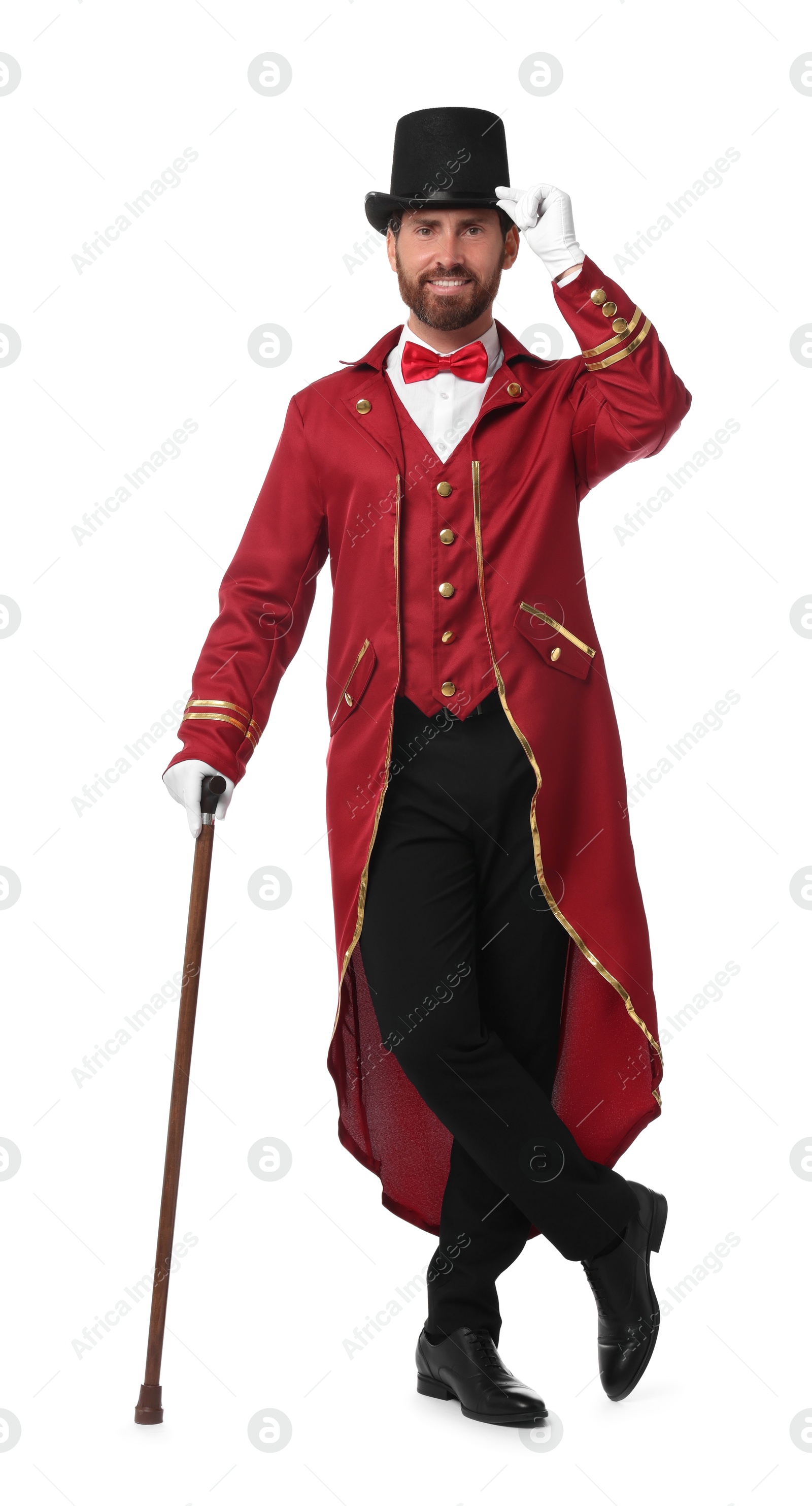 Photo of Portrait of showman in red costume and hat on white background