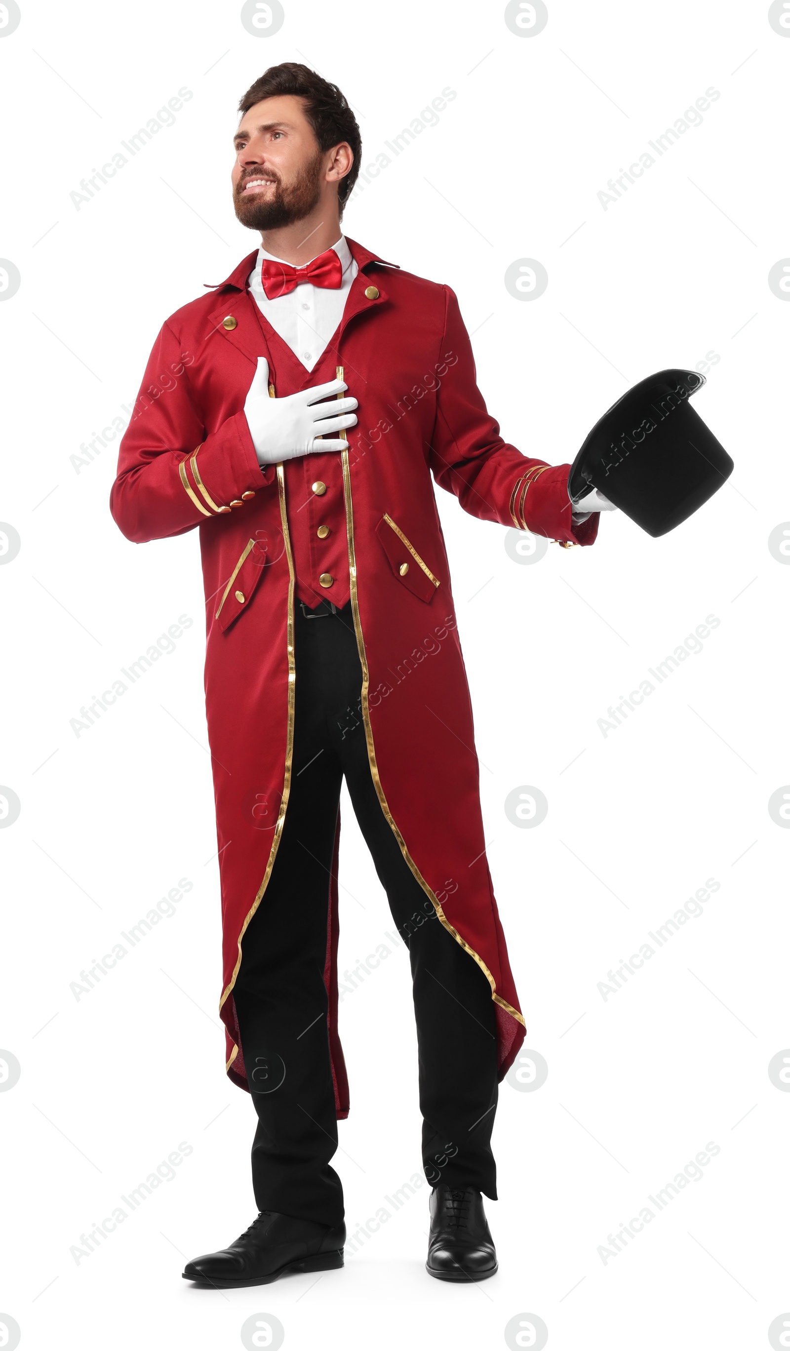 Photo of Portrait of showman in red costume and hat on white background