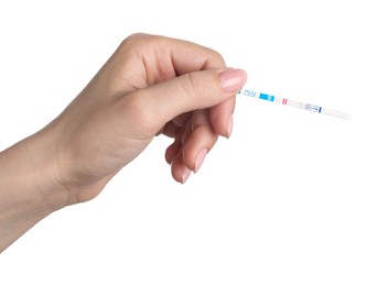 Photo of Woman holding pregnancy test on white background, closeup