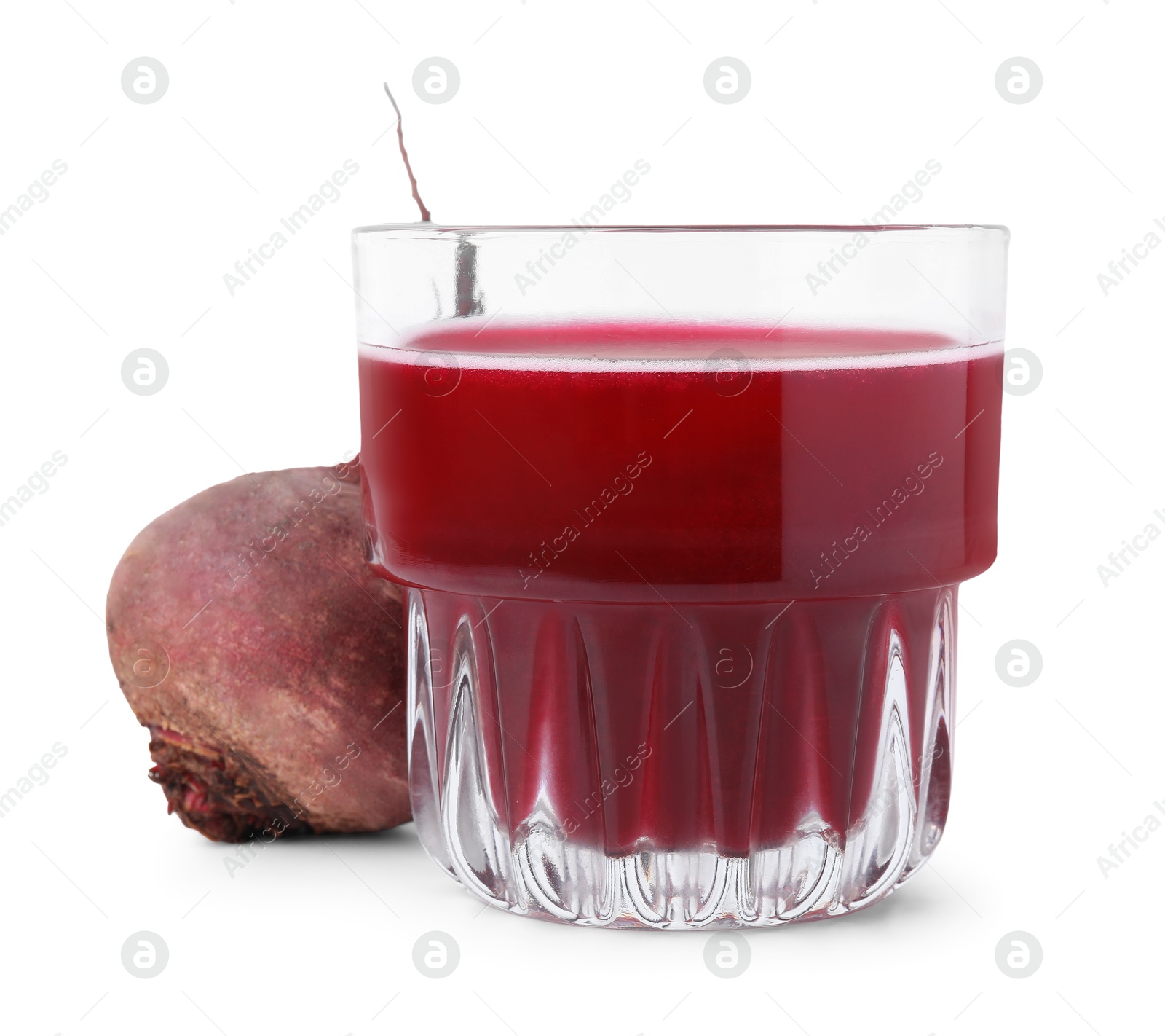 Photo of Fresh beet juice in glass and ripe vegetable isolated on white