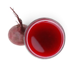 Fresh beet juice in glass and ripe vegetable isolated on white, top view