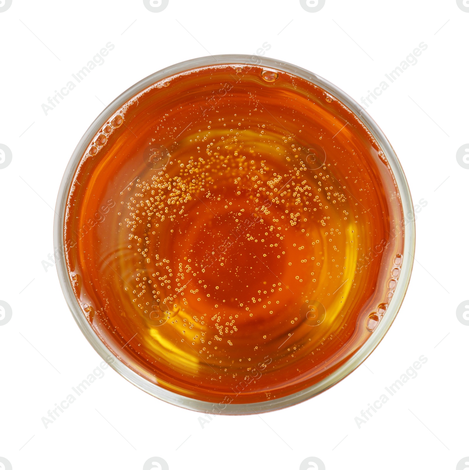 Photo of Glass of light beer isolated on white, top view