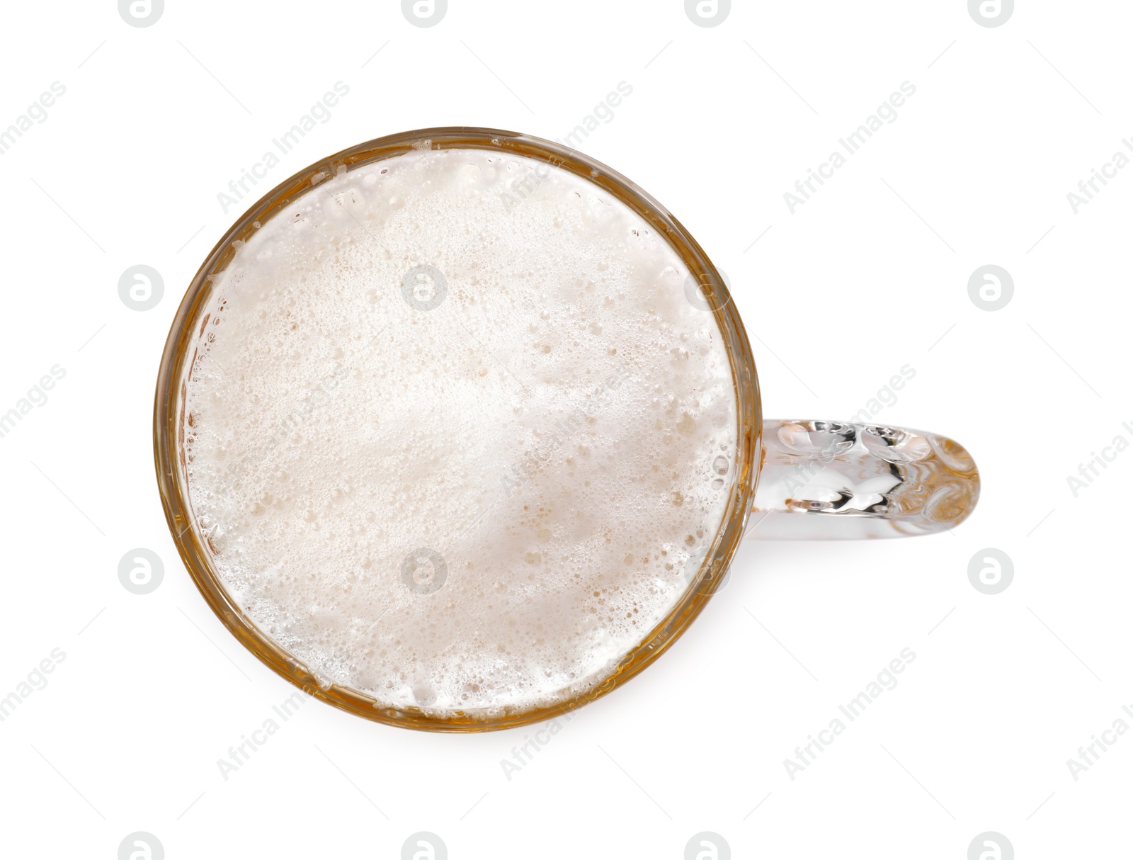 Photo of Glass mug of beer isolated on white, top view