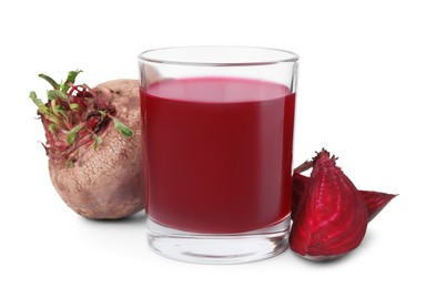 Photo of Fresh beet juice in glass and ripe vegetables isolated on white