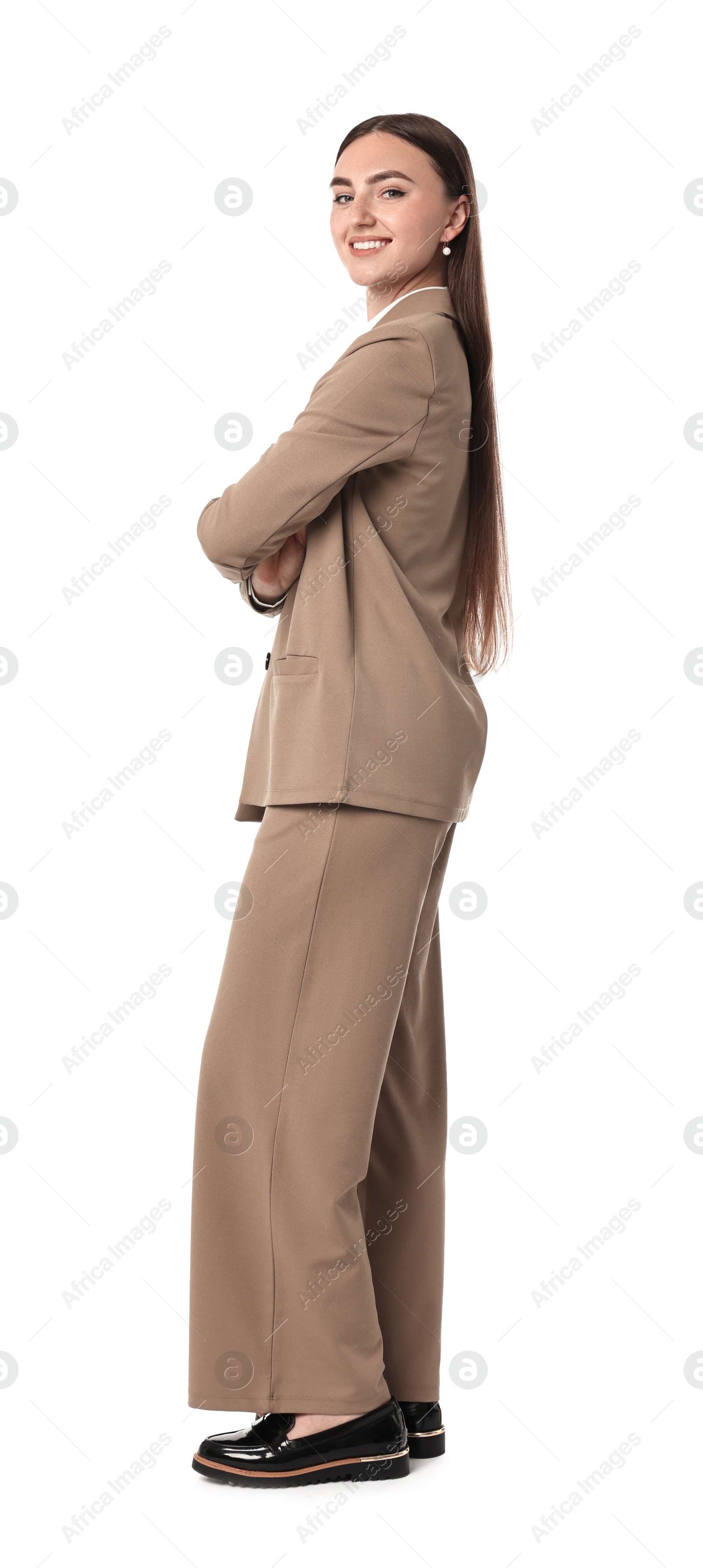 Photo of Beautiful woman in beige suit on white background