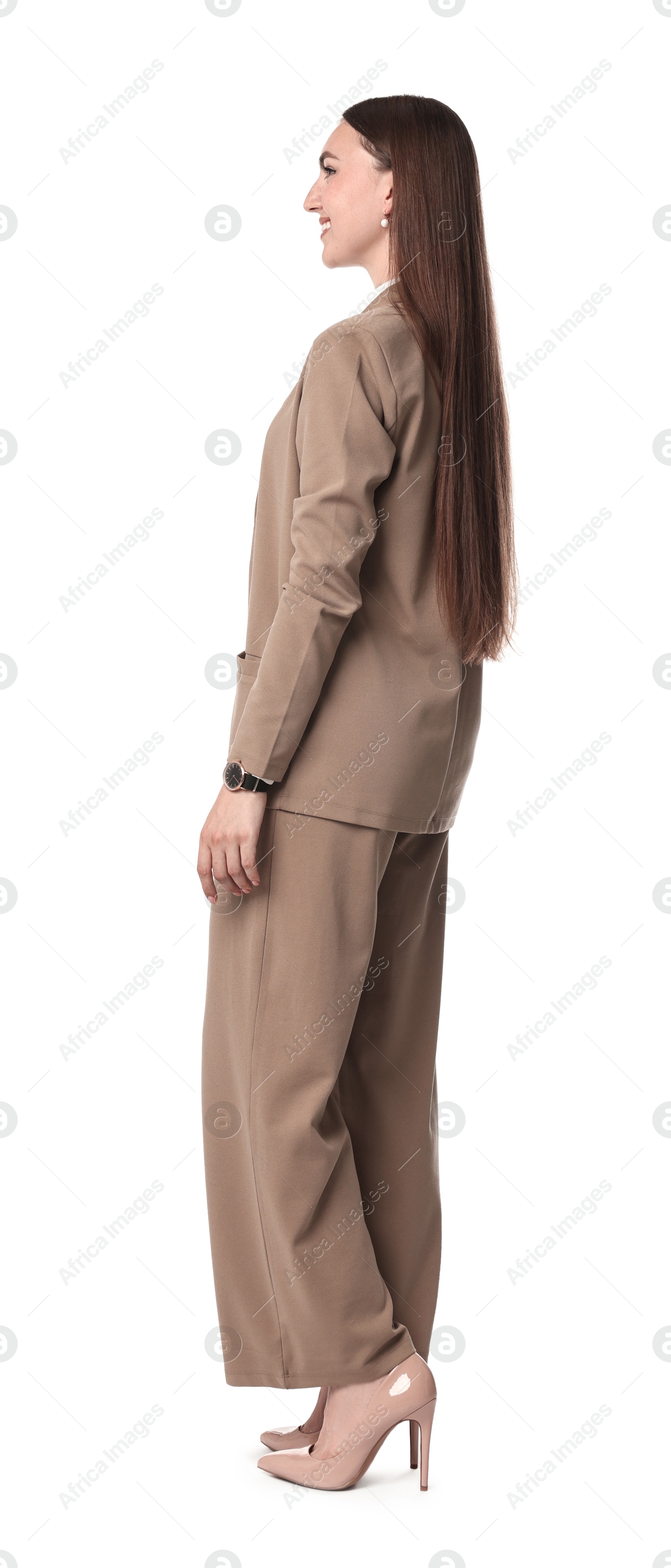 Photo of Beautiful woman in beige suit on white background