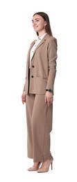 Beautiful woman in beige suit on white background