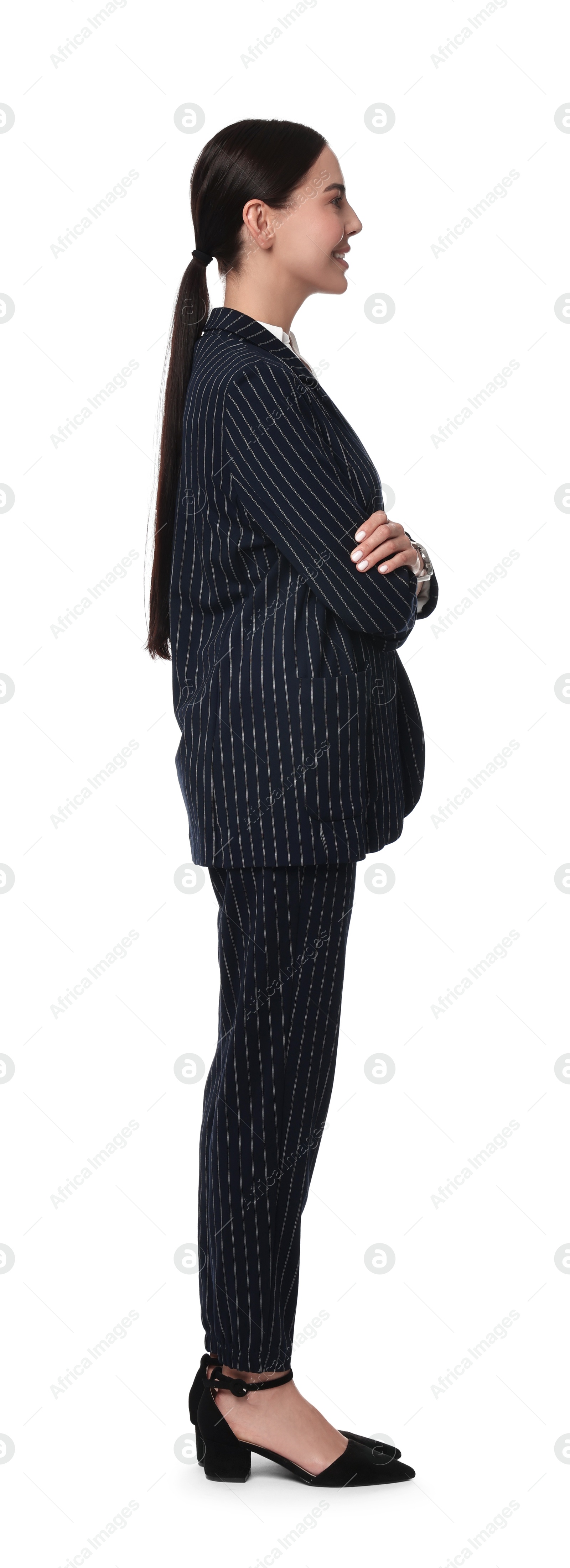 Photo of Beautiful woman in black striped suit on white background