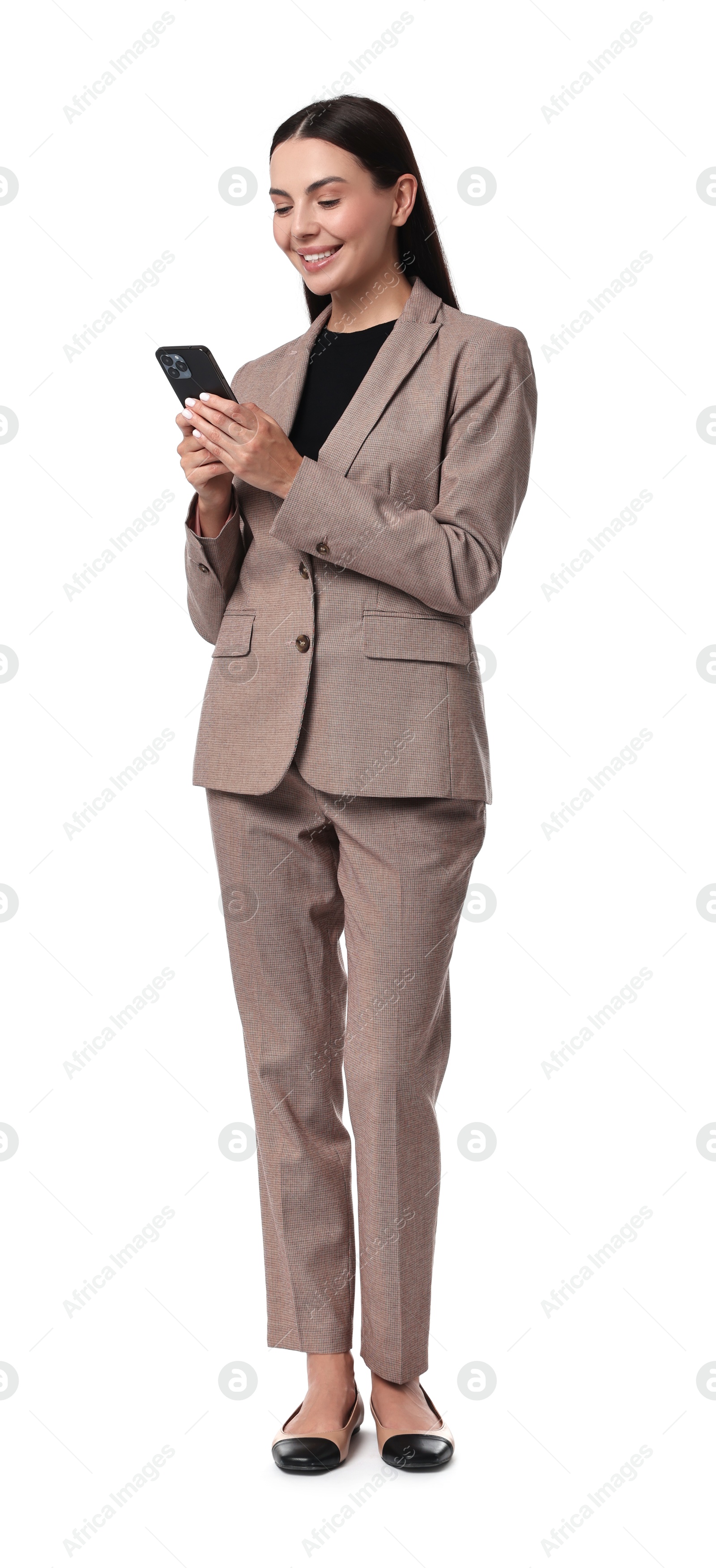 Photo of Beautiful woman in beige suit using smartphone on white background