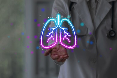 Image of Doctor holding virtual lungs in clinic, closeup