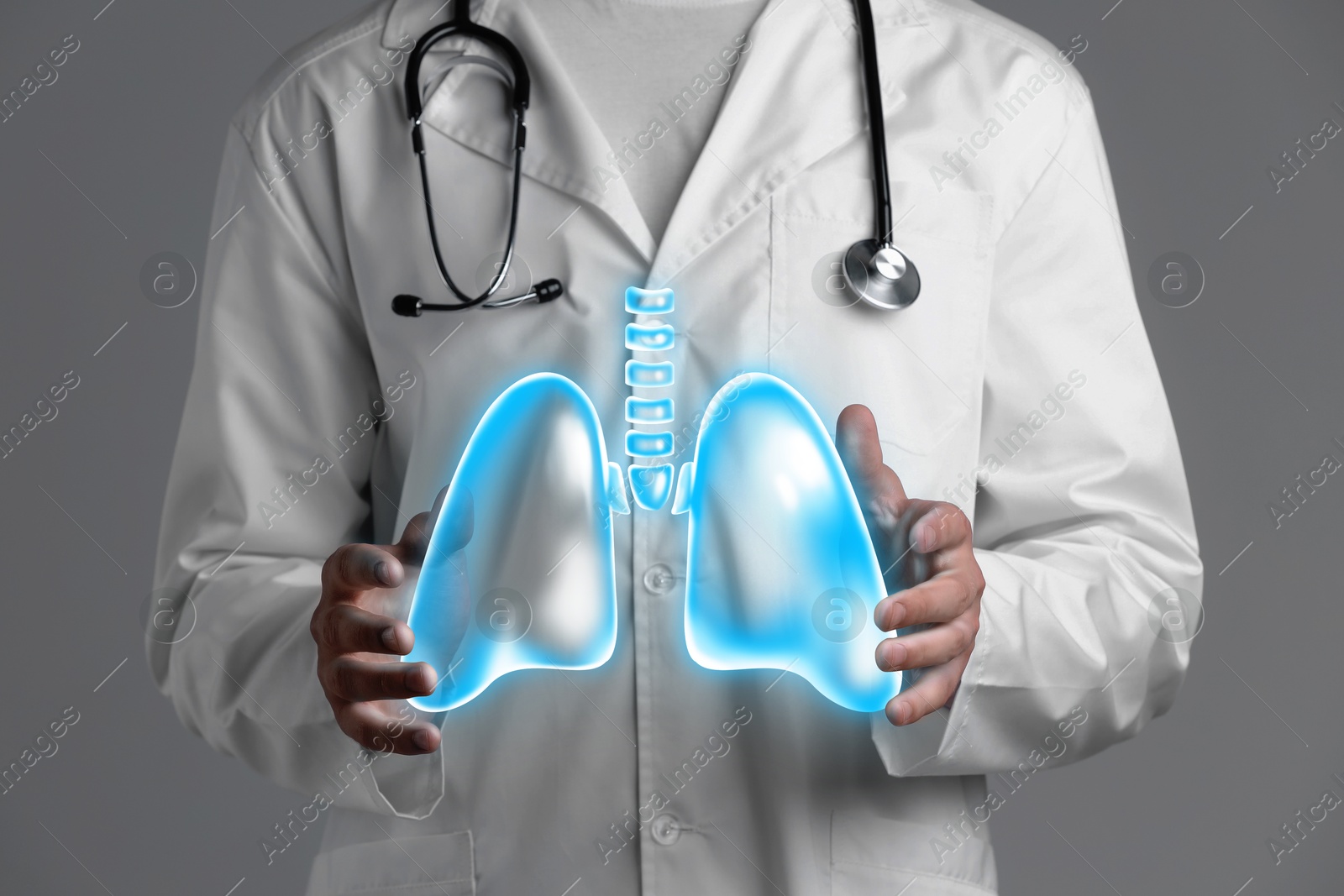 Image of Doctor holding virtual lungs on grey background, closeup