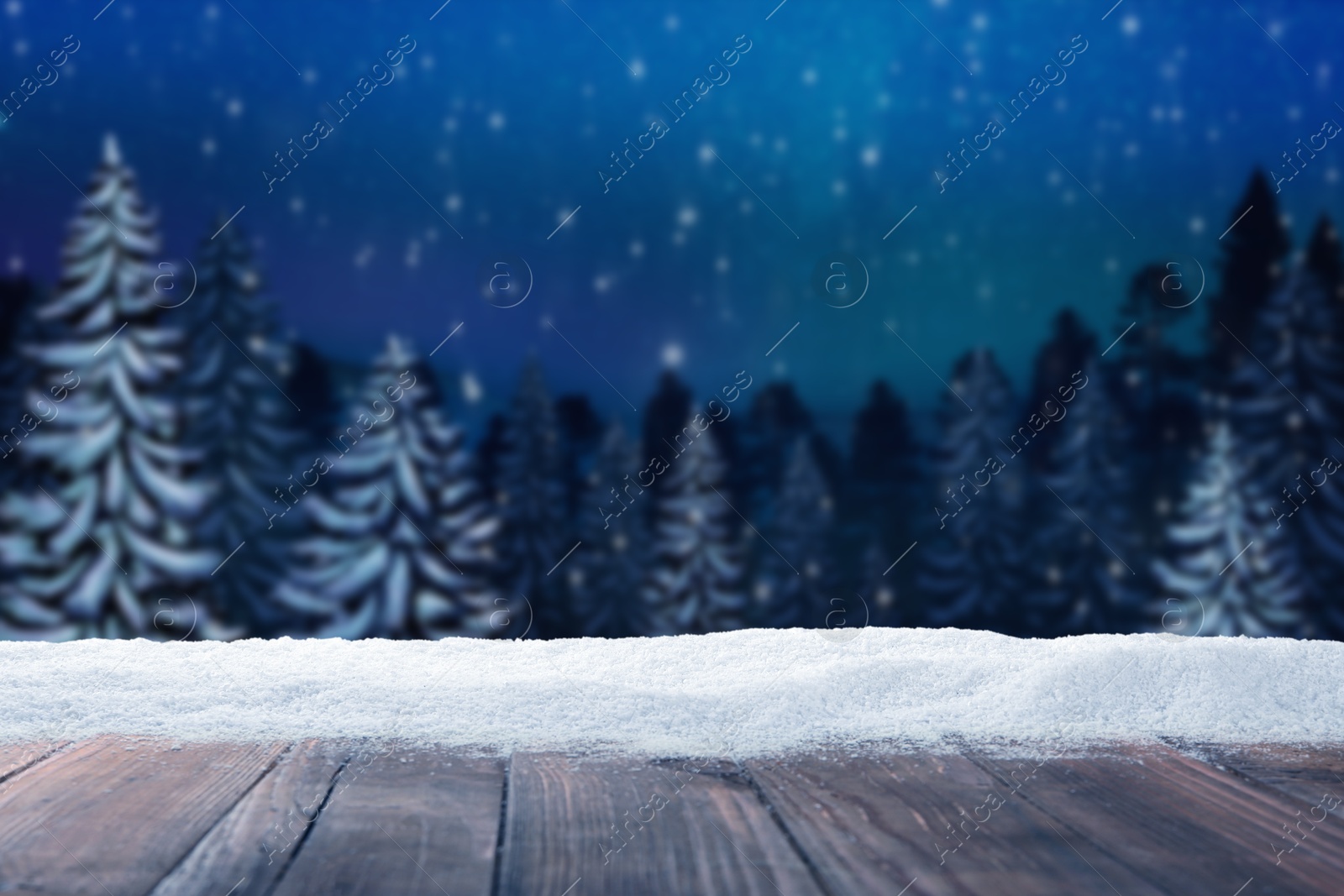 Image of Wooden table with snow in forest, space for text