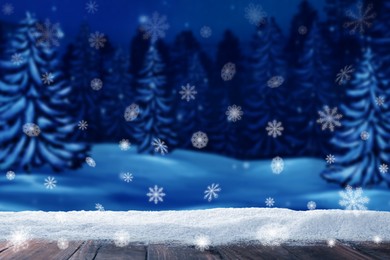 Image of Wooden table with snow in forest, space for text