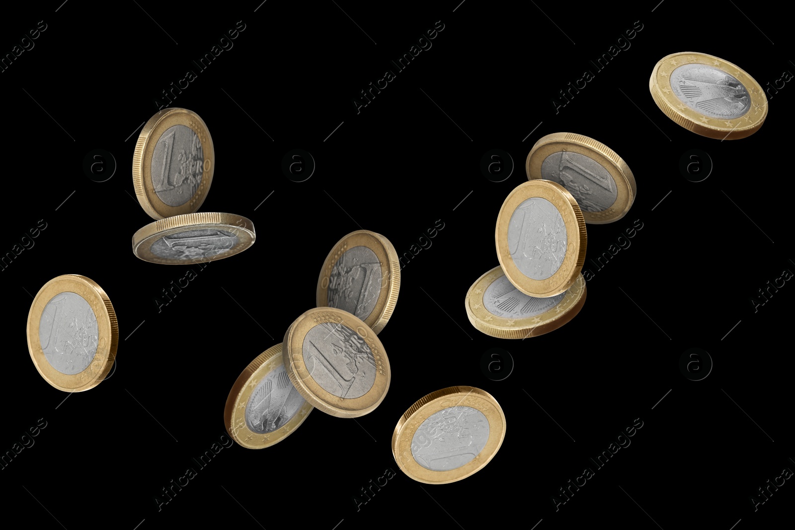 Image of Euro coins in air on black background