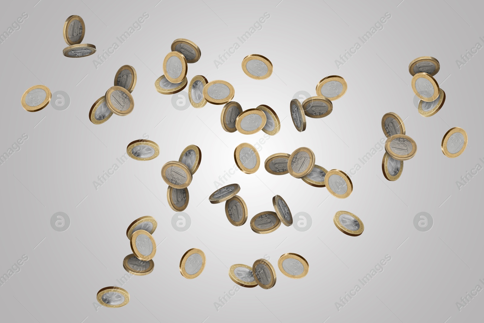 Image of Euro coins in air on light grey background