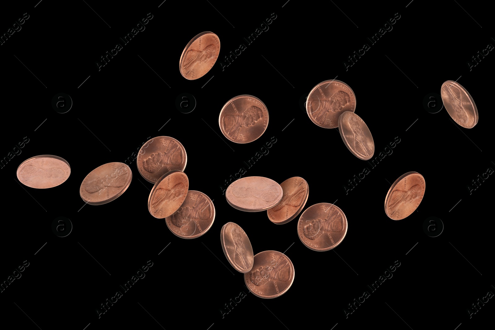 Image of United States one cent coins in air on black background