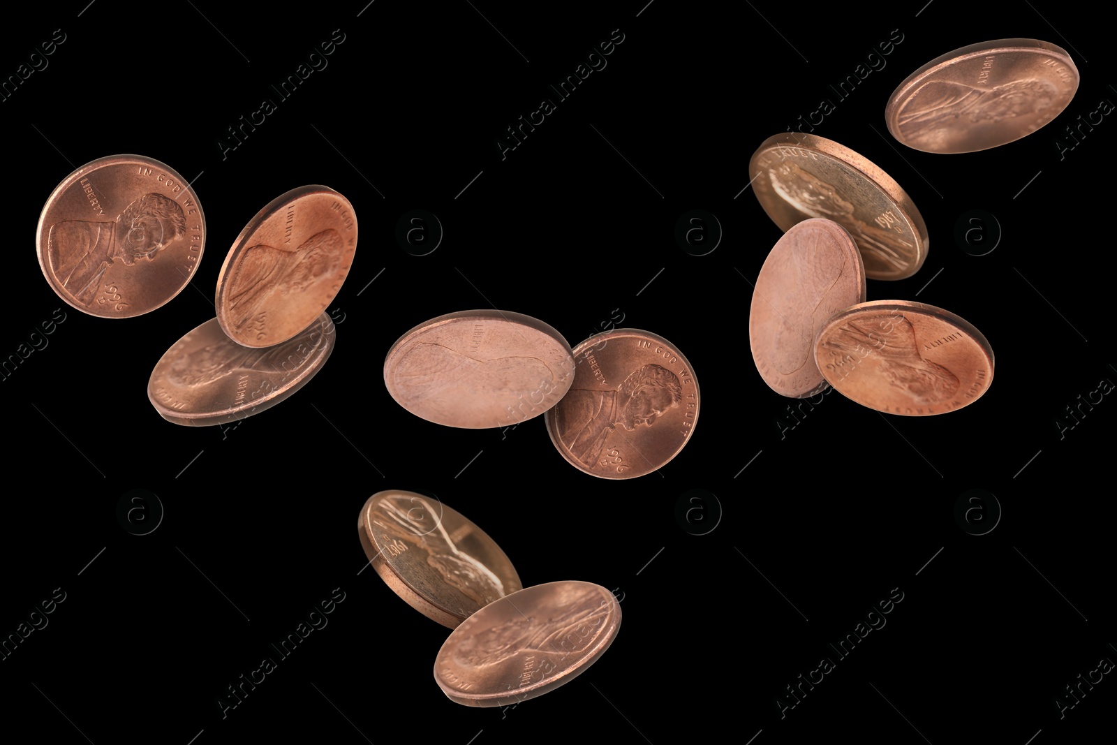 Image of United States one cent coins in air on black background