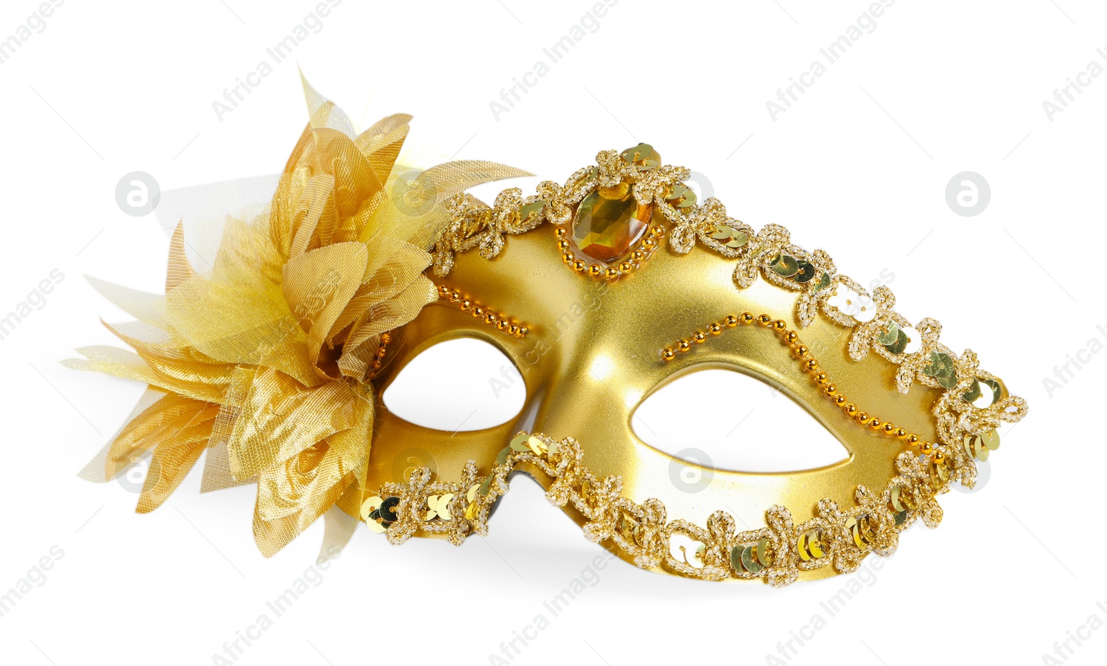 Photo of Beautiful golden carnival mask isolated on white