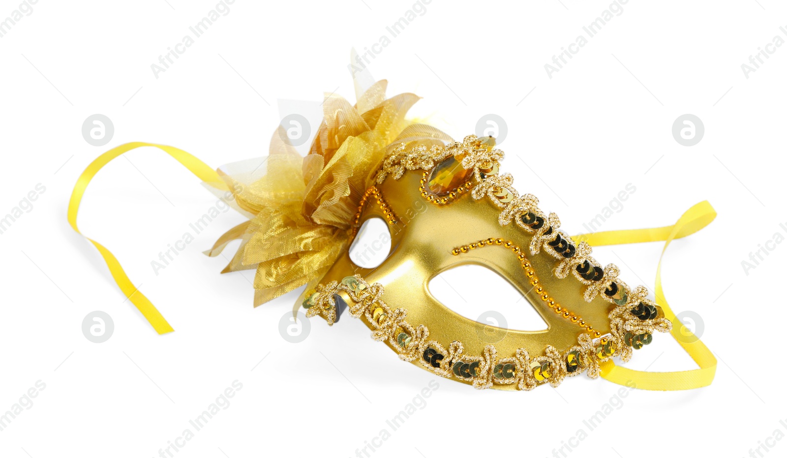 Photo of Beautiful golden carnival mask isolated on white