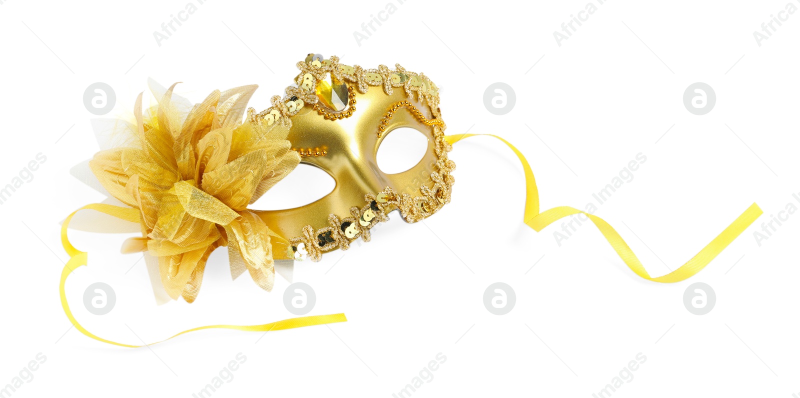 Photo of Beautiful golden carnival mask isolated on white