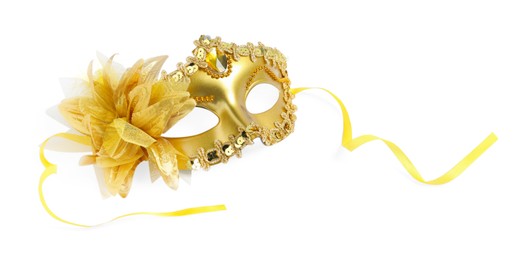 Photo of Beautiful golden carnival mask isolated on white