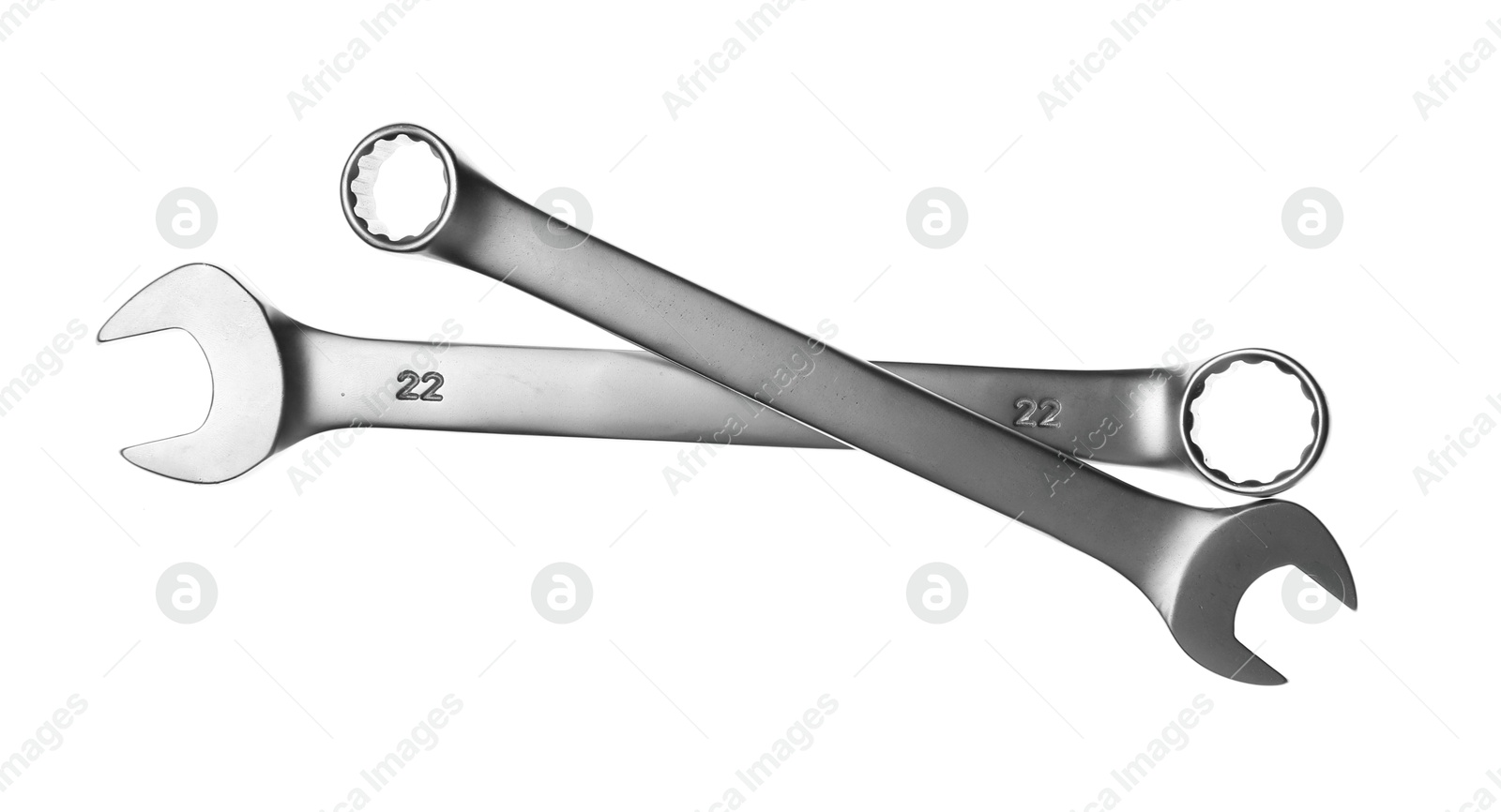 Photo of Two ratcheting wrenches isolated on white, top view. Auto mechanic tools