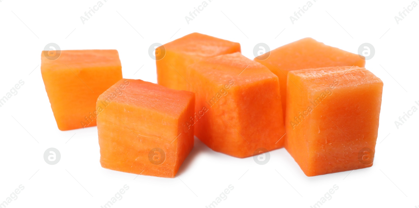 Photo of Pieces of fresh ripe carrot isolated on white