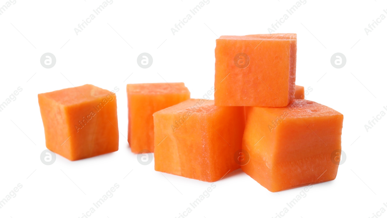 Photo of Pieces of fresh ripe carrot isolated on white