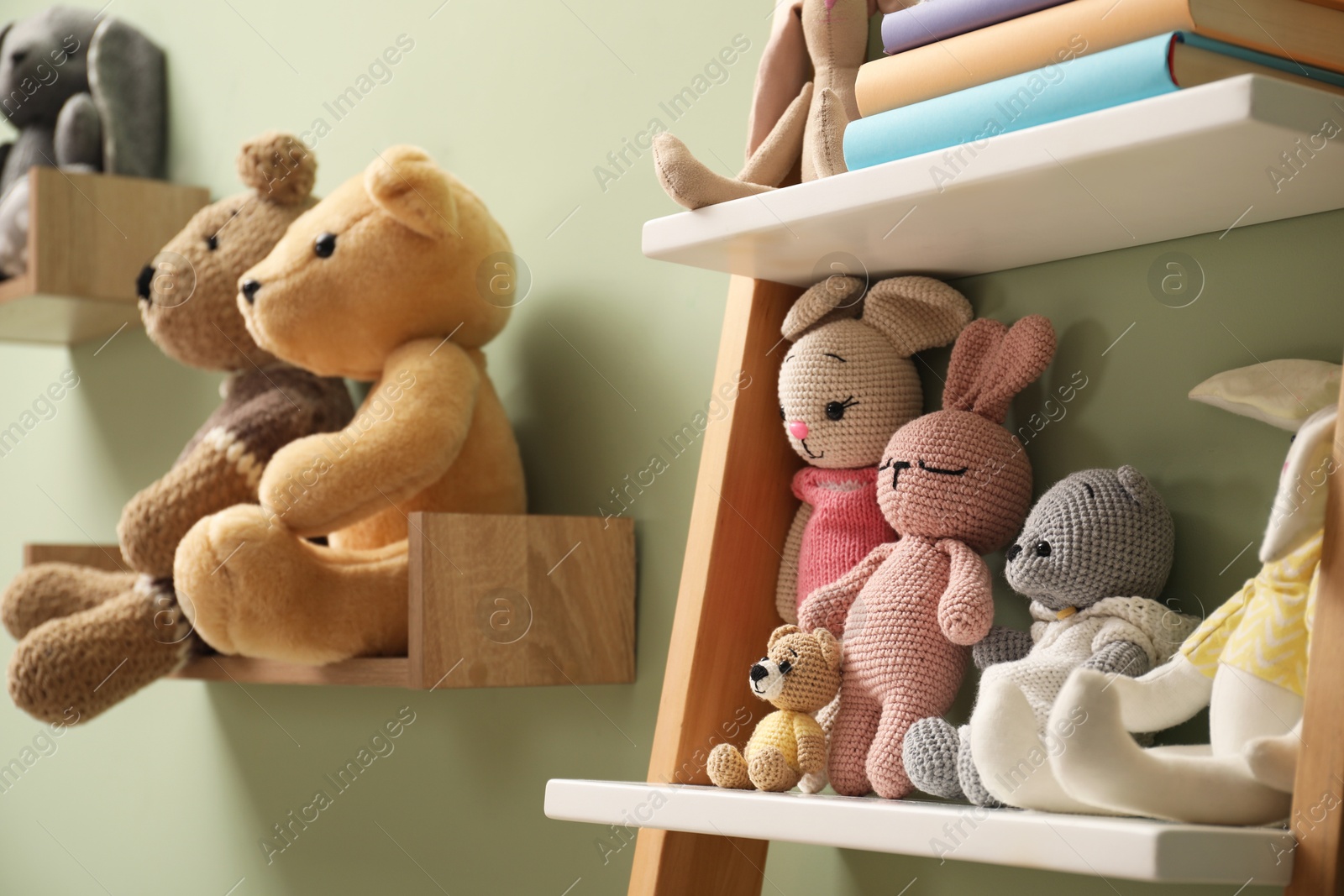 Photo of Different toys and furniture in child room