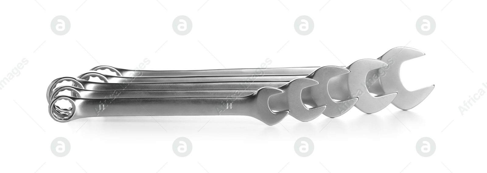 Photo of Set of ratcheting wrenches isolated on white. Auto mechanic tools