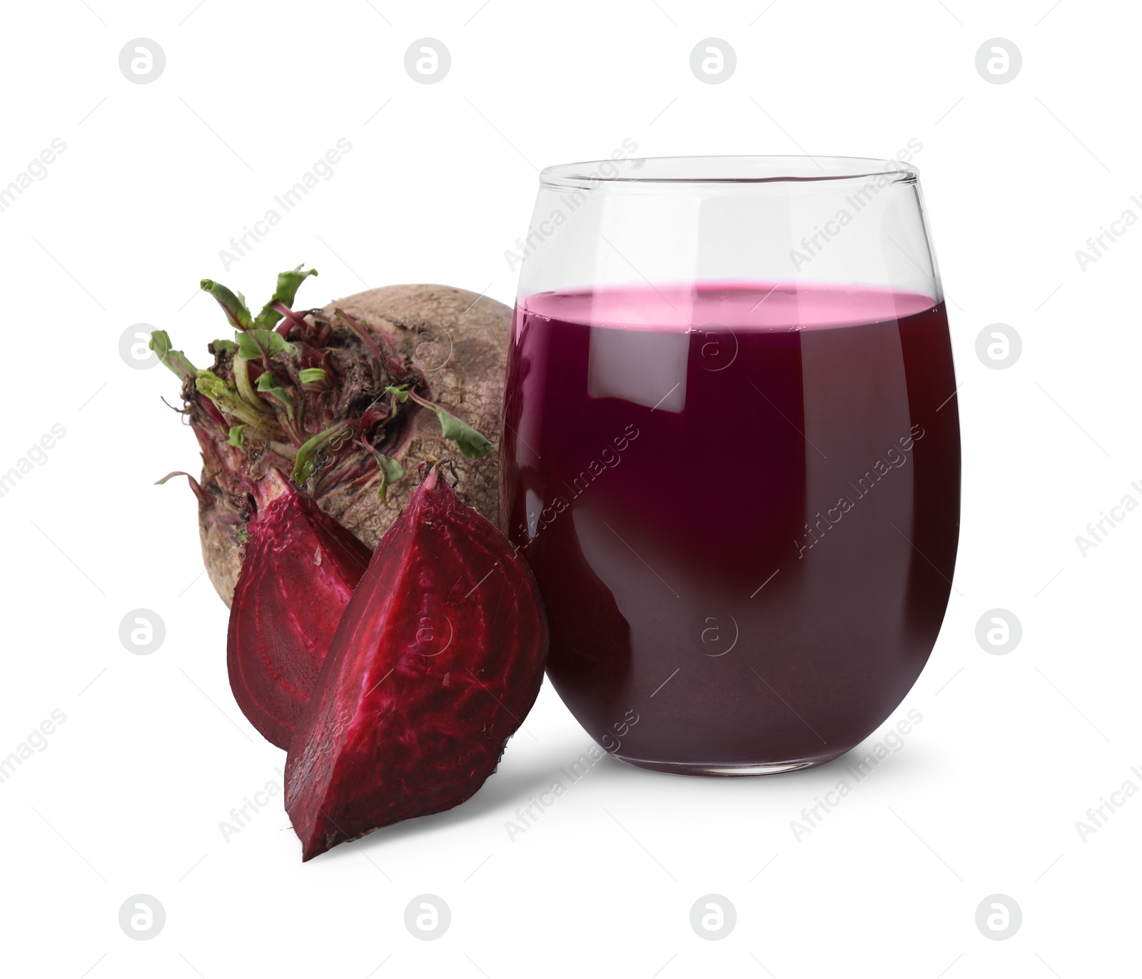 Photo of Fresh beet juice in glass and ripe vegetables isolated on white