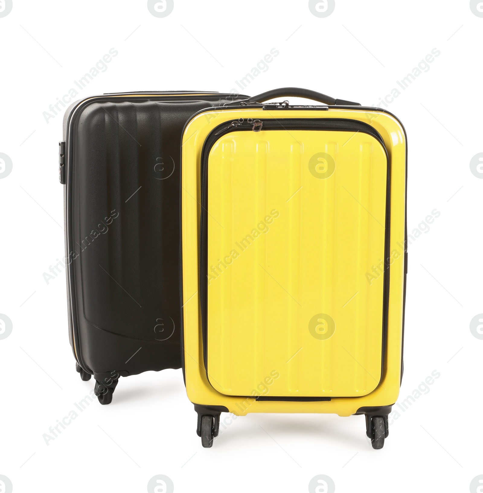 Photo of Two new yellow and black suitcases isolated on white