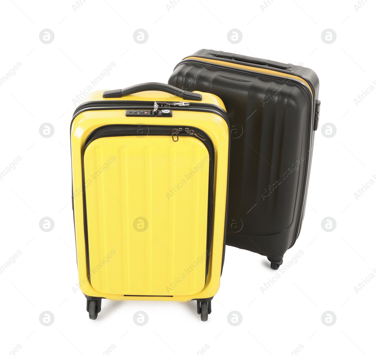 Photo of Two new yellow and black suitcases isolated on white