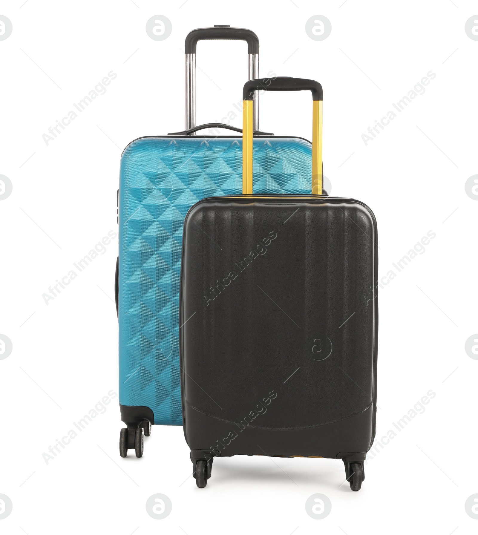 Photo of Two new light blue and black suitcases isolated on white