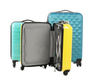 New yellow and light blue suitcases isolated on white