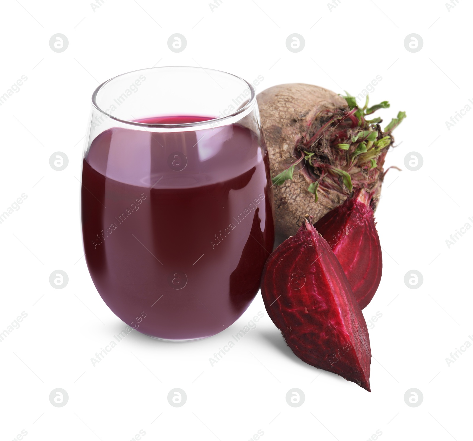 Photo of Fresh beet juice in glass and ripe vegetables isolated on white