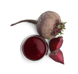 Photo of Fresh beet juice in glass and ripe vegetables isolated on white, top view