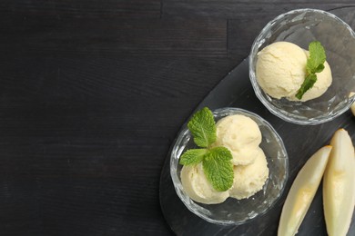 Photo of Scoops of melon sorbet with mint in glass dessert bowls and fresh fruit on dark wooden table, flat lay. Space for text