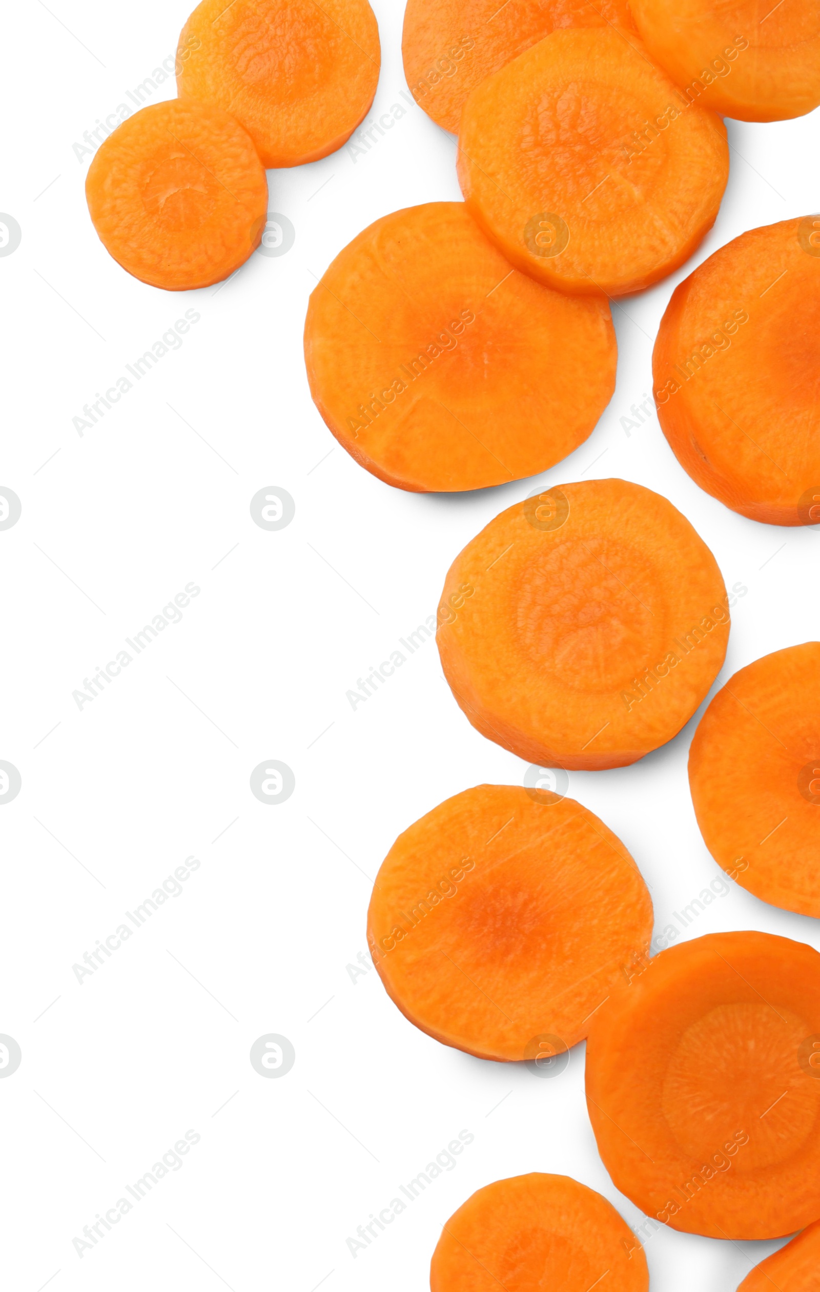 Photo of Slices of fresh ripe carrot isolated on white, top view