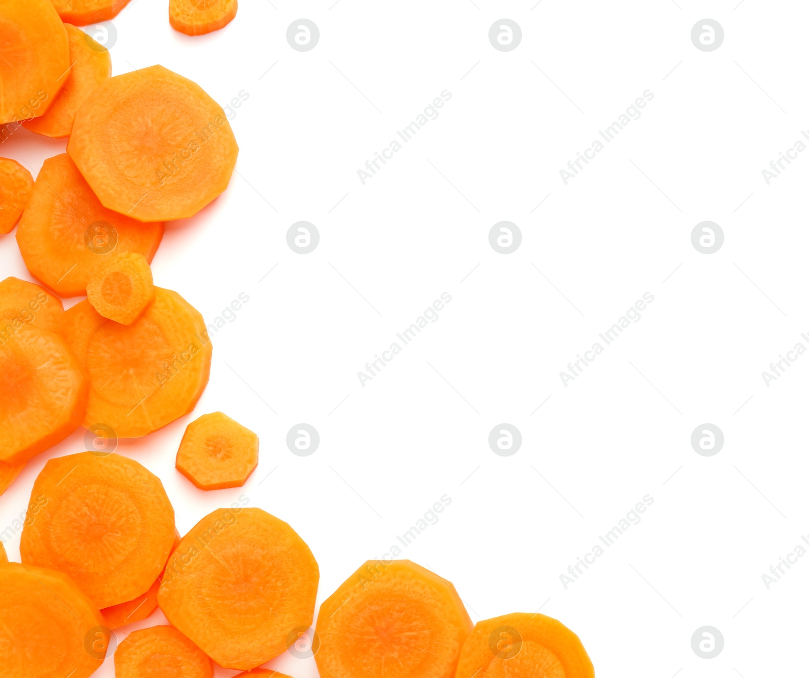 Photo of Slices of fresh ripe carrot isolated on white, top view