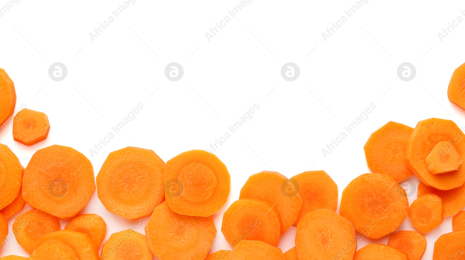 Photo of Slices of fresh ripe carrot isolated on white, top view